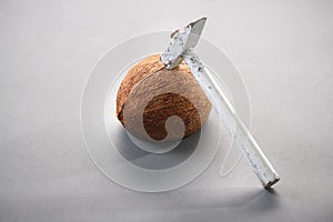 Coconut with a hammer