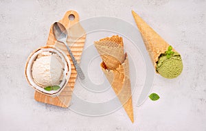 Coconut ice cream flavours in half of coconut setup on white stone background. Summer and Sweet menu concept