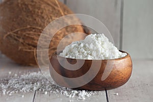 Coconut milk powder in wooden bowl