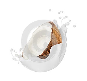 Coconut with milk splashes close-up, isolated on white