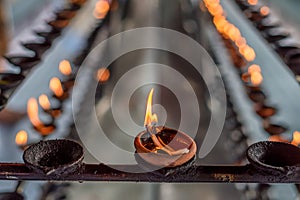 Coconut oil lamps in temple