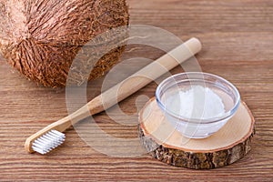 Coconut oil toothpaste, natural alternative for healthy teeth, wooden toothbrush