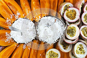 Coconut and papaya fruit served on a tray in Rarotonga Cook Islands