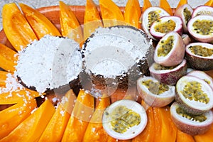 Coconut and papaya fruit served on a tray in Rarotonga Cook Islands