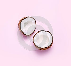 Coconut on pink background. Minimal concept.