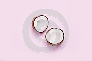 Coconut on pink background. Minimal concept
