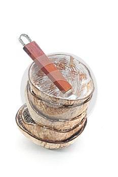 A coconut shell after grated by coconut grater