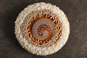 Coconut sponge cake with desiccated coconut photo
