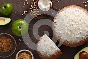 Coconut sponge cake with desiccated coconut photo