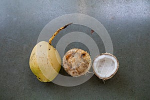 Coconut in three forms tender, pealed and cracked