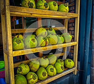 Coconut water inlined in the rack, green coconut in the rack