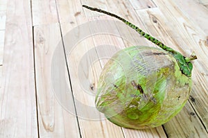 Coconut on wooden background