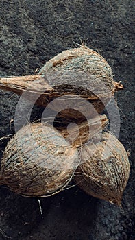 coconuts that have had their husks removed photo