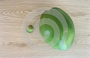 Coconuts on a Natural Weathered Wood Background