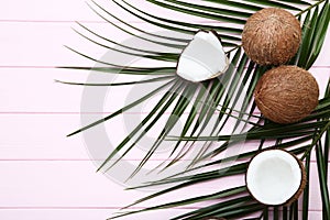 Coconuts with palm leafs