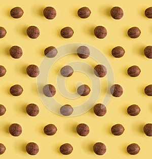 Coconuts pattern flat lay on yellow background. Pop art creative design