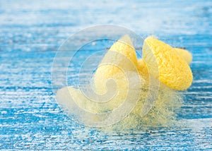 Cocoon Silk on Blue wooden floor.