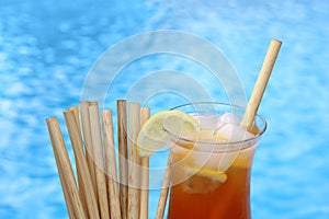Coctail with bamboo reed straws