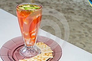 Coctel de Camaron, prawn cocktail, at the beach in Veracruz, Mexico. Copy space photo