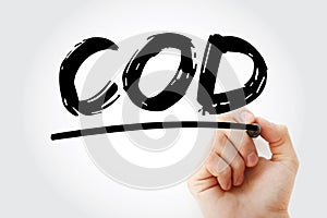 COD - Cash On Delivery acronym with marker, concept background