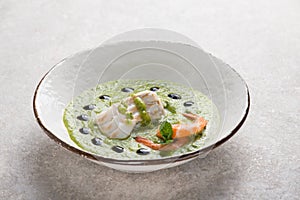 cod fillet and shrimp over zucchini cream