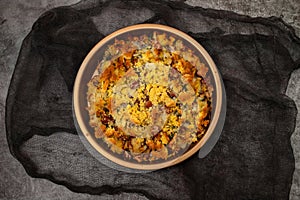 cod fish with corn bread, spinach and beans on dish