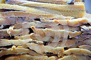 Cod fish salted codfish in a row stacked
