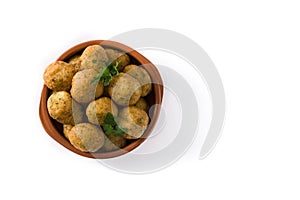 Cod fritters in crock pot isolated