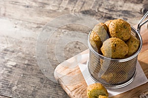 Cod fritters in metal chest copy space