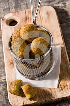 Cod fritters in metal chest