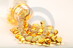 Cod liver oil capsules- on white background.