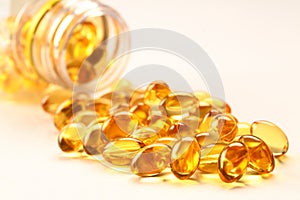 Cod liver oil capsules- on white background.