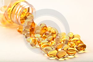 Cod liver oil capsules- on white background.