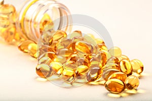 Cod liver oil capsules- on white background.