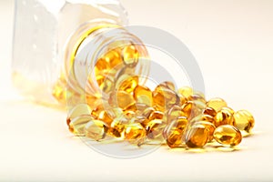 Cod liver oil capsules- on white background.