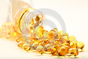 Cod liver oil capsules- on white background.