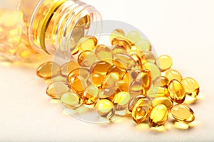 Cod liver oil capsules- on white background.