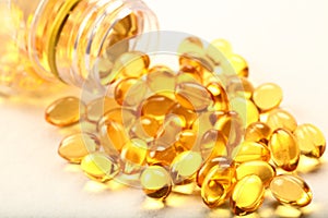 Cod liver oil capsules- on white background.