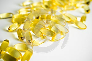 Cod liver oil omega 3 gel capsules. Fish oil capsules. Copy space for your text. Medical pill or vitamin's capsule