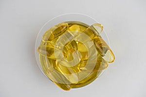 Cod liver oil omega 3 gel capsules isolated on white background