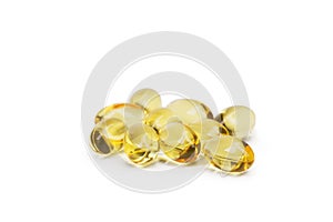 Cod liver oil omega 3 gel capsules or pils isolated on a white background. A group of transparent fish oil tablets.