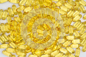Cod liver oil omega-3 softgels. Background and texture from capsules