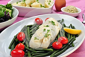 Cod loins with beans and tomato
