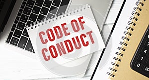 Code of Conduct Text written on notebook page