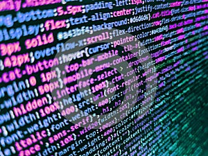 Code on dark background. Developer working on program codes in office. Javascript code in bracket software. Web or application