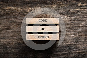 Code of ethics spelled on wooden pegs