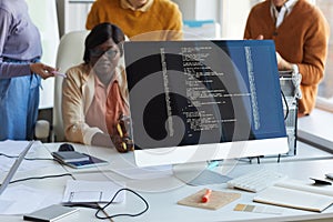 Code on Screen in IT Development Office