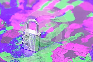 A coded silver padlock on a vivid abstract background.