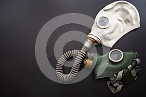 Codependent relationship, negative emotions, hazardous affair and toxic love concept with two gas masks connected on the same hose