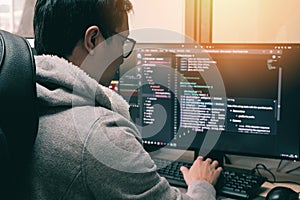 Coder programmers working in office, Programmer analyst writing code - Coder working from home with work on screen computer for